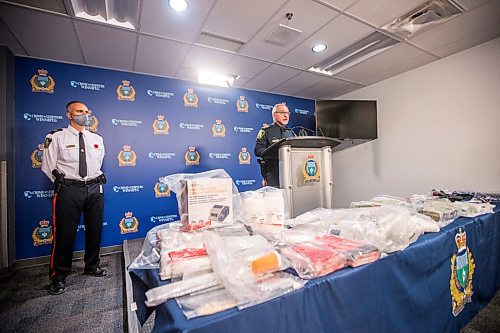 MIKAELA MACKENZIE / WINNIPEG FREE PRESS

Constable Rob Carver speaks as inspector Max Waddell listens during a press conference about the dismantling of an interprovincial drug network at the Winnipeg Police Service headquarters in Winnipeg on Thursday, Nov. 5, 2020. For Julia-Simone Rutgers story.

Winnipeg Free Press 2020