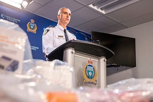 MIKAELA MACKENZIE / WINNIPEG FREE PRESS

Inspector Max Waddell speaks to the media about the dismantling of an interprovincial drug network and related seized goods (including guns, $300,000 in cash, and illegal drugs like cocaine) at a press conference at the Winnipeg Police Service headquarters in Winnipeg on Thursday, Nov. 5, 2020. For Julia-Simone Rutgers story.

Winnipeg Free Press 2020
