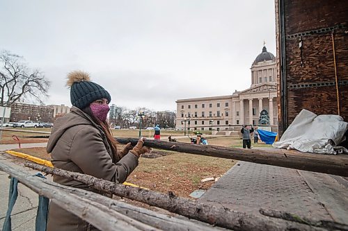 Mike Sudoma / Winnipeg Free Press
Supporter, Briittney Lavallee, helps pack up the remnants of the tipis and supplies at their camp as Manitoba legislation has passed Bill 2
November 6, 2020