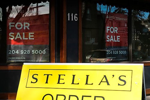 Daniel Crump / Winnipeg Free Press. For sale signs have been put up in the windows of the Stellas restaurant location on Sherbrooke Street. November 7, 2020.