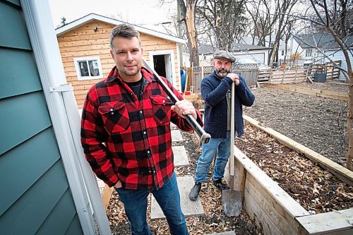 Daniel Crump / Winnipeg Free Press. Greg Maksymowic(left) ands neighbour Stuart Thomas (right) backyards will soon be a winter respite from the pandemic for their families. The houses at 1180 and 1186 Grosvenor took out the fence between them and built a hockey rink. November 7, 2020.