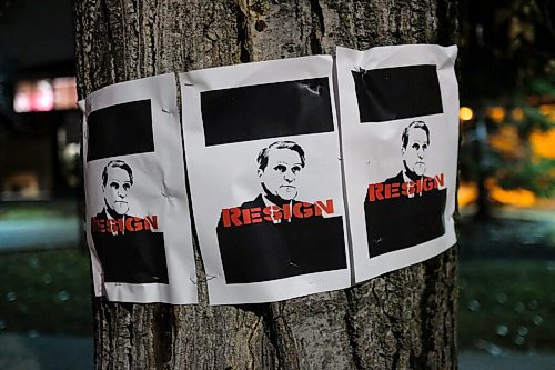 Daniel Crump / Winnipeg Free Press. Posters put up on a tree outside the Maples Personal Care Home call for minister of health Cameron Friesens resignation. November 7, 2020.