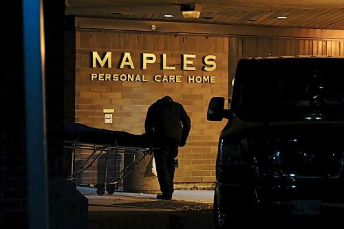 Daniel Crump / Winnipeg Free Press. A person from the coroners office removes a body from the Maples Personal Care Home. The Winnipeg care home is the site of a COVID-19 outbreak. November 7, 2020.