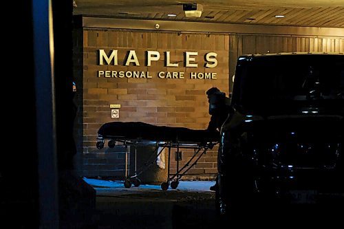 Daniel Crump / Winnipeg Free Press. A person from the coroners office removes a body from the Maples Personal Care Home. The Winnipeg care home is the site of a COVID-19 outbreak. November 7, 2020.