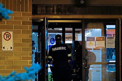 Daniel Crump / Winnipeg Free Press. Paramedics attend a call at the Maples Personal Care Home. The Winnipeg care home is the site of a COVID-19 outbreak. November 7, 2020.