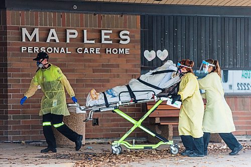 MIKAELA MACKENZIE / WINNIPEG FREE PRESS

The Stretcher Service of Manitoba wheels a gurney into the building at the Maples long term care home in Winnipeg on Monday, Nov. 9, 2020. For --- story.

Winnipeg Free Press 2020