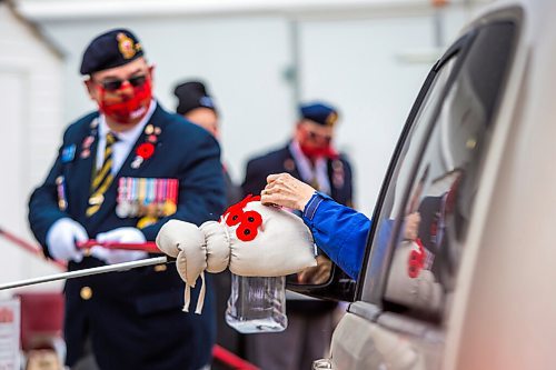 MIKAELA MACKENZIE / WINNIPEG FREE PRESS

A poppy drive-through at the Charleswood Legion in Winnipeg on Monday, Nov. 9, 2020. Standup.

Winnipeg Free Press 2020