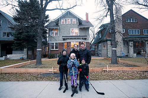 JOHN WOODS / WINNIPEG FREE PRESS
Shane and Kara McCartney with their children, left to right, Aiden, Emerson, and Blake are photographed with their home rink Monday, November 9, 2020. Many families plan on building their own rinks to get through the winter and COVID-19 restrictions.

Reporter: Ben