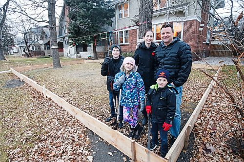 JOHN WOODS / WINNIPEG FREE PRESS
Shane and Kara McCartney with their children, left to right, Aiden, Emerson, and Blake are photographed with their home rink Monday, November 9, 2020. Many families plan on building their own rinks to get through the winter and COVID-19 restrictions.

Reporter: Ben
