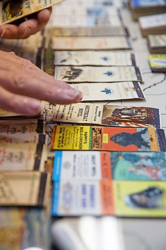 MIKE DEAL / WINNIPEG FREE PRESS
Denis Bouchard a matchbook collector since his mid-teens, has one of the most exhaustive collections in the country - close to a quarter million or so, stored in photo albums, three-ring binders and drawers. 
Denis sorts a collection of about 1700 matchbooks that were given to him recently.
201109 - Monday, November 09, 2020.