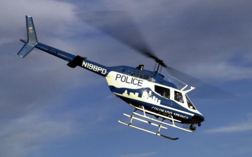 A Colorado Springs Police Department helicopter patrols over Colorado Springs on Thursday October 18, 2001.  Jay Janner/The Gazette - for winnipeg free press