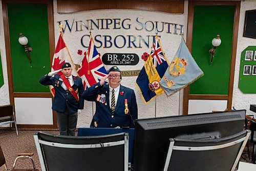 JESSE BOILY  / WINNIPEG FREE PRESS
Marc Pelletier and Alex Vacca salute as the Last Post is played at the live-streamed Remembrance Day ceremony at the  South Osborne Legion on Wednesday. Remembrance Day ceremonies looked different this year due to the current COVID-19 restrictions. Wednesday, Nov. 11, 2020.
Reporter: