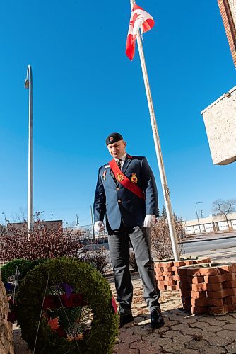 JESSE BOILY  / WINNIPEG FREE PRESS
Alex Vacca looks over the wreaths at the live-streamed Remembrance Day ceremony at the  South Osborne Legion on Wednesday. Remembrance Day ceremonies looked different this year due to the current COVID-19 restrictions. Wednesday, Nov. 11, 2020.
Reporter: