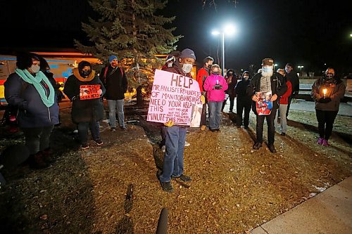 JOHN WOODS / WINNIPEG FREE PRESS
Ron Henry holds a photo of his mother as he speaks to family members gathered outside Maples Personal Care Home for a vigil for residents in Winnipeg Wednesday, November 11, 2020. COVID-19 has killed many residents of the care home.

Reporter: Jay