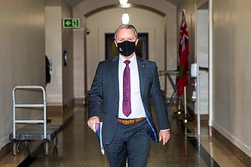 MIKAELA MACKENZIE / WINNIPEG FREE PRESS

Health, seniors and active living minister Cameron Friesen walks in to speak to the media at a call-in press conference at the Manitoba Legislative Building in Winnipeg on Friday, Nov. 13, 2020. For Danielle Da Silva story.

Winnipeg Free Press 2020