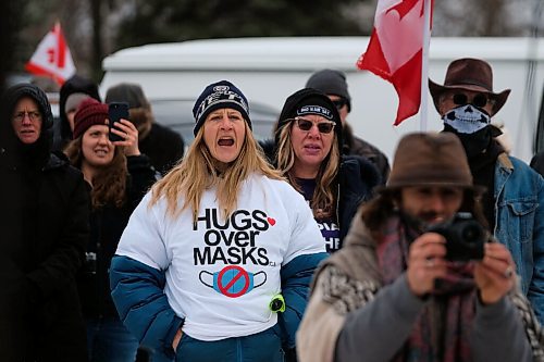 Daniel Crump / Winnipeg Free Press. Anti-mask protestors from the Hugs Over Masks group attend a rally at AD Penner Park in Steinbach . November 14, 2020.