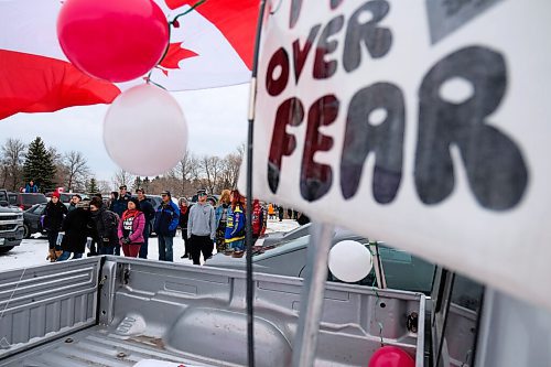 Daniel Crump / Winnipeg Free Press. Anti-mask protestors from the Hugs Over Masks group attend a rally at AD Penner Park in Steinbach . November 14, 2020.