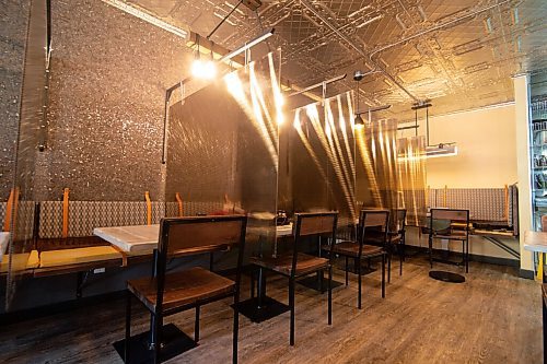 Mike Sudoma / Winnipeg Free Press
Bistro on Notre Dame owner, Dean Herkert, worked with an interior designer to make the restaurant feel warm, friendly and safe, with Covid 19 dividers and precautions built into the design.
November 16, 2020