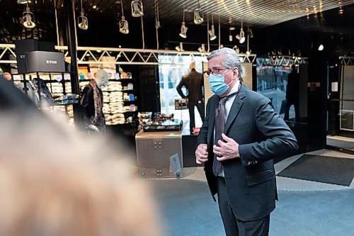 JESSE BOILY  / WINNIPEG FREE PRESS
Paul Stiller puts on a tie at Hanford-Drewitt, a  clothing store for men that has been in business since 1948. Tuesday, Nov. 17, 2020.
Reporter: Dave Sanderson