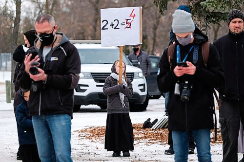 Daniel Crump / Winnipeg Free Press. Members of a christian group attend the Hugs Over Masks anti-mask rally at AD Penner Park in Steinbach, Manitoba. November 14, 2020.