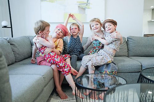 RUTH BONNEVILLE / WINNIPEG FREE PRESS

INTERSECTION - Triplets & Co.


Triplets & Co. Andee-Anne Genereux  (Andy)  Owner, clothing designer, mom of 5.

Photo of her kids having fun as they model her clothing at home.  


What: This is for an Intersection piece on Andy's biz, Triplets & Co. She and her husband Cameron are the parents of five daughters, all under 7, the youngest of which - 4 years old - are identical triplets. Exhausted from parenting, a couple of years ago she cut herself a break once a week for a few hours, during which she headed to the basement to paint & draw, two of her passions. Because she had a sewing machine down there gathering dust - it had been a housewarming gift a few years before - she got it out and started making quilts and blankets using her drawings. 

One thing led to another and now she is the owner of her own clothing line, Triplets & Co. specializing in all-cotton designs - traditional classic-looking dresses and jumpers for gals age 2 to 8. Her kids are walking advertisements - all five should be home when photographer arrives so we can get them, along with  mom, in the shots - including of course the triplets, the namesake of her biz. 


This is for the Saturday Nov 21 Intersection.
 
 Dave Sanderson story. 


Nov 16th,  2020