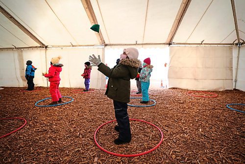 RUTH BONNEVILLE / WINNIPEG FREE PRESS

local - VIRUS TENT CLASSROOMS

Kindergarten students from  Ecole Sage Creek taking part in their gym class inside tents set up on the school grounds site Tuesday.  

Photos of them playing games with bean bags, balancing them, throwing them up and catching them and cornhole.  


VIRUS TENT CLASSROOMS: The Louis Riel School Division is piloting tent classrooms in three of its schools during the pandemic for students to use for gym activities outside to protect them from high winds.  Festival du Voyageur is actually lending school admin with some of the festival's tents during the off-season to use for this pilot. 

MAGGIE'S STORY.



Date: Tuesday, Nov. 17, 2020 
Subject: Principal Marc Poirier 
Place: Ecole Sage Creek School - tent classrooms

Nov 17th,  2020