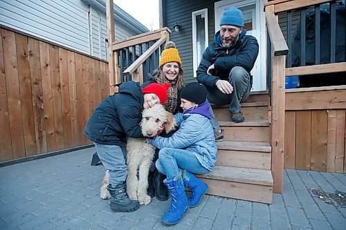 JOHN WOODS / WINNIPEG FREE PRESS
Stacy Cardigan Smith and her partner Casey Norman with their children Eddy and Greta and their dog Murray are photographed in their backyard in Winnipeg Tuesday, November 17, 2020. 

Reporter: Sabrina