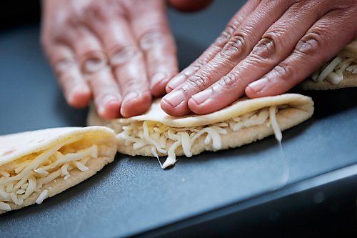 JOHN WOODS / WINNIPEG FREE PRESS
Betty Calderon-Villasenor of the BMC Market on Osborne makes some tacos and quesadillas  in her restaurant in Winnipeg Thursday, November 19, 2020. 

Reporter: Eva