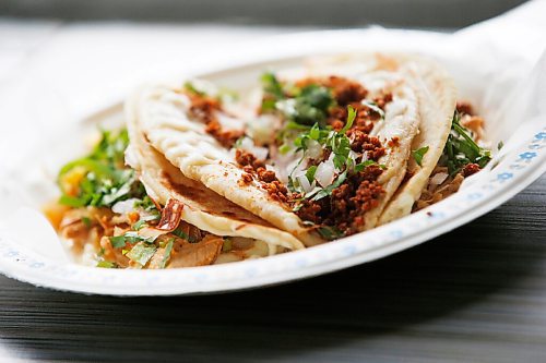 JOHN WOODS / WINNIPEG FREE PRESS
Betty Calderon-Villasenor of the BMC Market on Osborne makes some tacos and quesadillas  in her restaurant in Winnipeg Thursday, November 19, 2020. 

Reporter: Eva