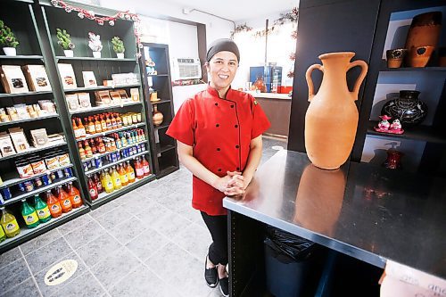 JOHN WOODS / WINNIPEG FREE PRESS
Betty Calderon-Villasenor of the BMC Market on Osborne makes some tacos and quesadillas  in her restaurant in Winnipeg Thursday, November 19, 2020. 

Reporter: Eva