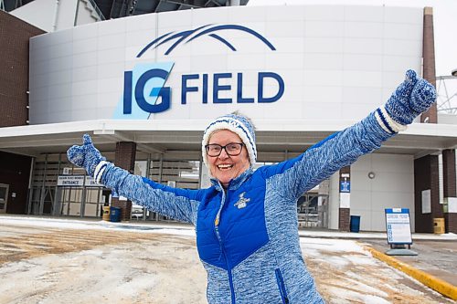 MIKE DEAL / WINNIPEG FREE PRESS
Carol Barrott the ticket and fan services manager for the Winnipeg Blue Bombers outside of IG Field Friday morning celebrating the one year anniversary of the teams Grey Cup win.
201120 - Friday, November 20, 2020.