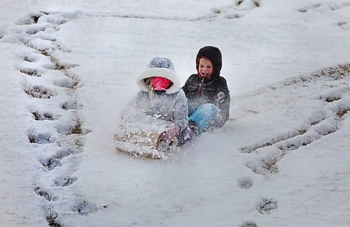 RUTH BONNEVILLE / WINNIPEG FREE PRESS

Local - Sno much fun! Standup

Siblings get covered in snow while tobogganning with their grandmother at Victoria Jason Park in Transcona Friday.  

(Didn't provide names, just allowed me to capture photos)

Nov 20th,  2020
