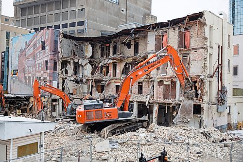 MIKE DEAL / WINNIPEG FREE PRESS
The St. Regis Hotel at 285 Smith Street is being demolished. The hotel opened on July 12, 1911.
From CentreVenture..."CentreVenture has sold the property to Rockport Investment Group Inc. who intends to construct a mixed-use development project including retail, structured parking, office and residential. The project is in the architectural planning stage and is slated to begin construction in 2021. 
This redevelopment will join the growing number of projects rising in, and around, downtown's Sport Hospitality and Entertainment District (SHED)."

201124 - Tuesday, November 24, 2020.
