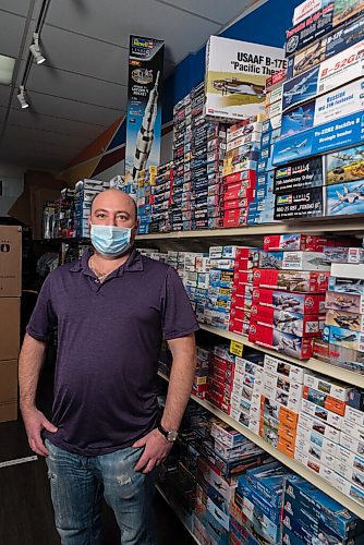 JESSE BOILY  / WINNIPEG FREE PRESS
Igor Lukianovsky, owner of Hobby Sense, stops for a photo by some of the models at his store on Wednesday. Wednesday, Nov. 25, 2020.
Reporter:Randall King