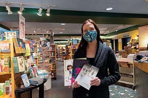 JESSE BOILY  / WINNIPEG FREE PRESS
Angela Torgerson shows some of the popular childrens books of the year at the McNally Robinsons Grant Park location on Wednesday. Wednesday, Nov. 25, 2020.
Reporter: Ben Sigurdson