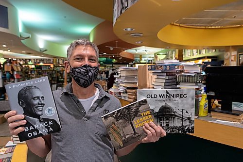 JESSE BOILY  / WINNIPEG FREE PRESS
Chris Hall, co-owner at McNally Robinson Booksellers, shows some of the popular books this year at the McNally Robinsons Grant Park location on Wednesday. Wednesday, Nov. 25, 2020.
Reporter: Ben Sigurdson