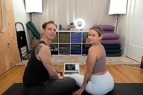 JESSE BOILY  / WINNIPEG FREE PRESS
Noah Krol and Marisa Cline, owners of Peg City Yoga, pose for a photo in their home studio where they now stream their yoga lessons online, on Thursday. Thursday, Nov. 26, 2020.
Reporter: Eva Wasney