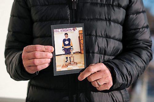 Daniel Crump / Winnipeg Free Press. Bruno Zarrillo, a former star player with the River East Royal Knights of the MMJHL, holds of photo of himself from his playing days. November 26, 2020.