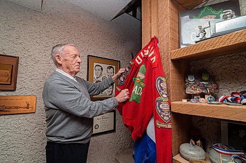 Mike Sudoma / Winnipeg Free Press
Former Team Canada Curler,  Donald Gordon Duguid looks over his Team Canada jacket hung up amongst his medals and other curling memorabilia hes collected during his career Thursday afternoon. Duguid will be receiving the Order of Canada Friday for his contributions to the growth of the sport of curling as an athlete, broadcaster and teacher.
November 26, 2020