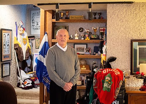 Mike Sudoma / Winnipeg Free Press
Former Team Canada Curler,  Donald Gordon Duguid stands amongst his medals, trophys and other curling memorabilia hes collected during his career Thursday afternoon. Duguid will be receiving the Order of Canada Friday for his contributions to the growth of the sport of curling as an athlete, broadcaster and teacher.
November 26, 2020