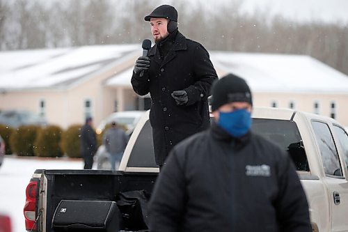 JOHN WOODS / WINNIPEG FREE PRESS
Church of God Restoration pastor Tobias Tissen speaks from a truck as RCMP officers and Manitoba Justice officials blocked the entrance to The City of God Church in Sarto, just south of Steinbach, to enforce Manitoba Health COVID-19 orders Sunday, November 29, 2020. 

Reporter: Abas