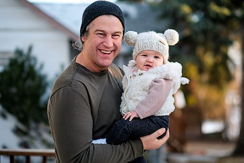 Daniel Crump / Winnipeg Free Press. Jordan Cieciwa and his 8-month-old daughter, Betty. Jordan is a workplace health and wellness expert who, along with Milt Stegall, is offering a "lunch and learn" on December 7 and 9 that will motivate people and educate them on how they can stay fit while at work/during the pandemic. November 30, 2020.