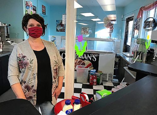 Canstar Community News Valerie Connolly stands in the ice cream parlour portion of her store, Headingley Foods, on Nov. 23. The store has Plexiglas shields dividing customers from employees. (GABRIELLE PICHÉ/CANSTAR COMMUNITY NEWS/HEADLINER)