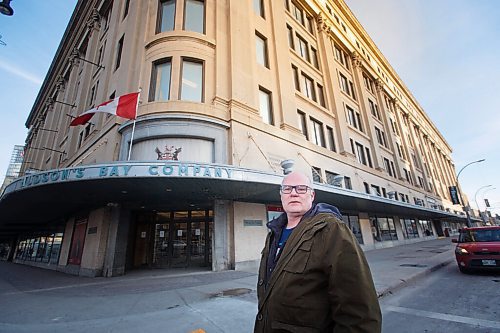 MIKE DEAL / WINNIPEG FREE PRESS
Local historian, Christian Cassidy, outside The Bay Downtown, Tuesday afternoon. The Bay Downtown has closed its doors for good.
201201 - Tuesday, December 01, 2020.