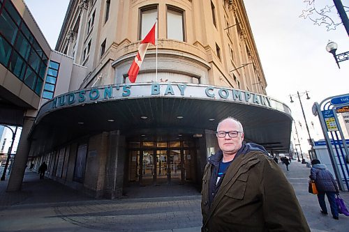MIKE DEAL / WINNIPEG FREE PRESS
Local historian, Christian Cassidy, outside The Bay Downtown, Tuesday afternoon. The Bay Downtown has closed its doors for good.
201201 - Tuesday, December 01, 2020.