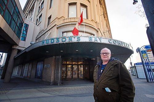 MIKE DEAL / WINNIPEG FREE PRESS
Local historian, Christian Cassidy, outside The Bay Downtown, Tuesday afternoon. The Bay Downtown has closed its doors for good.
201201 - Tuesday, December 01, 2020.