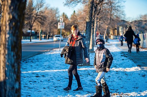 MIKAELA MACKENZIE / WINNIPEG FREE PRESS
Carmel Haub picks up her grandson, Hayden Watson (nine), at Sun Valley School in Winnipeg on Wednesday, Dec. 2, 2020. For Maggie/Kellen story.

Winnipeg Free Press 2020