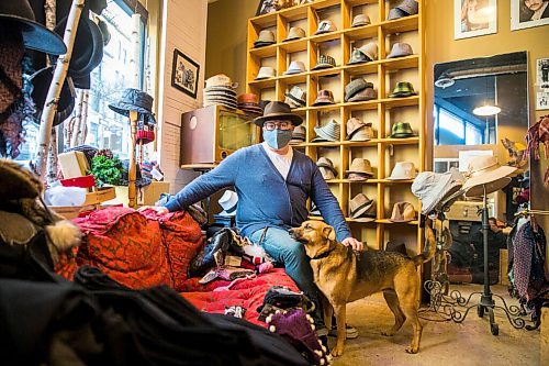 MIKAELA MACKENZIE / WINNIPEG FREE PRESS

Luke Nolan, owner of Haberdashery, and his dog, Tilley, pose for a portrait in his store in the Exchange District in Winnipeg on Thursday, Dec. 3, 2020. He is one of the vendors on the new site goodlocal.ca, a website dedicated to selling local Manitoba products, which had to halt all orders because they couldnt keep up with demand. For Cody story.

Winnipeg Free Press 2020