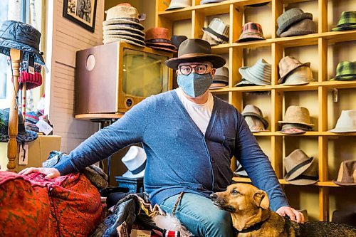 MIKAELA MACKENZIE / WINNIPEG FREE PRESS
Luke Nolan, owner of Haberdashery, and his dog, Tilley, pose for a portrait in his store in the Exchange District in Winnipeg on Thursday, Dec. 3, 2020. He is one of the vendors on the new site goodlocal.ca, a website dedicated to selling local Manitoba products, which had to halt all orders because they couldnt keep up with demand. For Cody story.
Winnipeg Free Press 2020