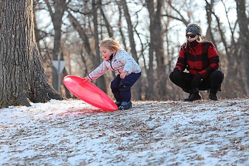 RUTH BONNEVILLE / WINNIPEG FREE PRESS

Standup - sliding 

Paige Henke (3)yrs), is all smiles as she slides down a hill at Kildonan Park. on Friday.  Her mom, Brooke Dmytriw, is close by to help her. 

Dec 4th,. 2020